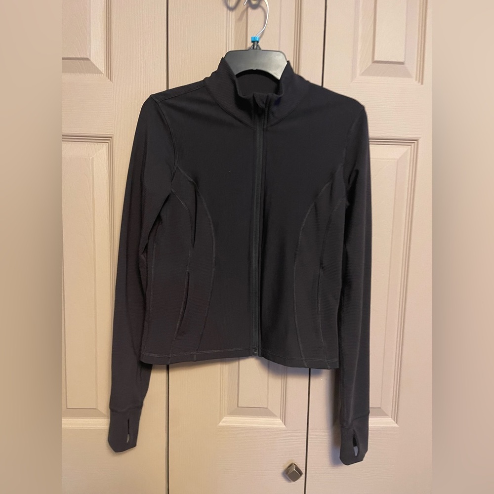 Woman’s black jogging jacket small